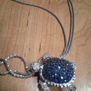 Elegant 14 Kt. White gold, Diamonds and  Sapphires Turtle Pendant Necklace.